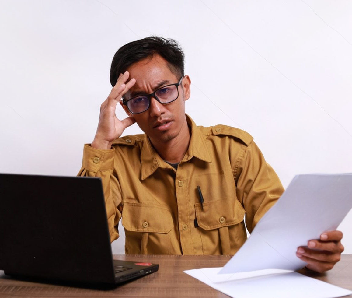 Person reviewing paperwork